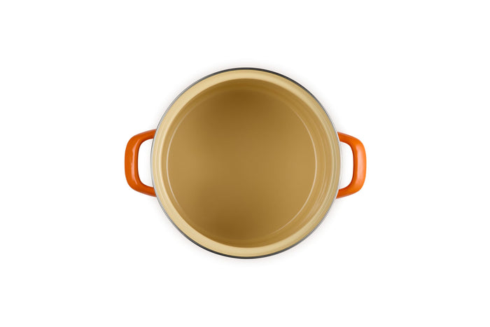 Beige inside stockpot with flame handles on a white background