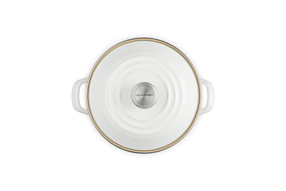 White stockpot with lid and handles on white background