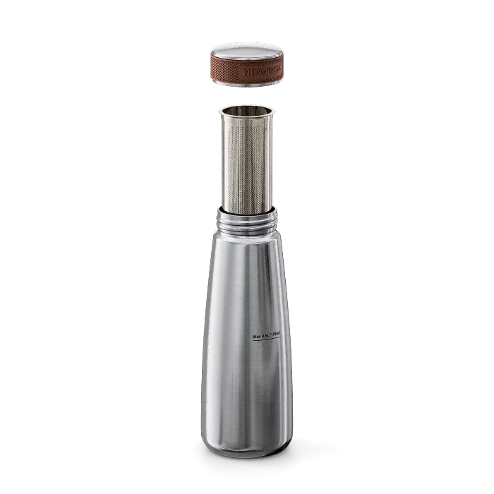 A stainless steel vacuum flask with its lid off, showing a separate metal infuser insert. The flask has a brushed silver finish with a small black logo on the front, and the lid features a brown textured grip.